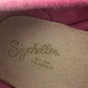 Pink suede shoes w/ ties. These shoes belong on an island.